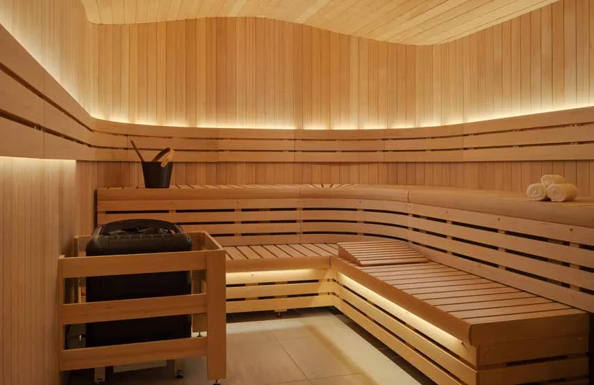 Paradisio: A curved ceiling and sectional benches, finished with LED lighting behind the backrests and beneath the seating.